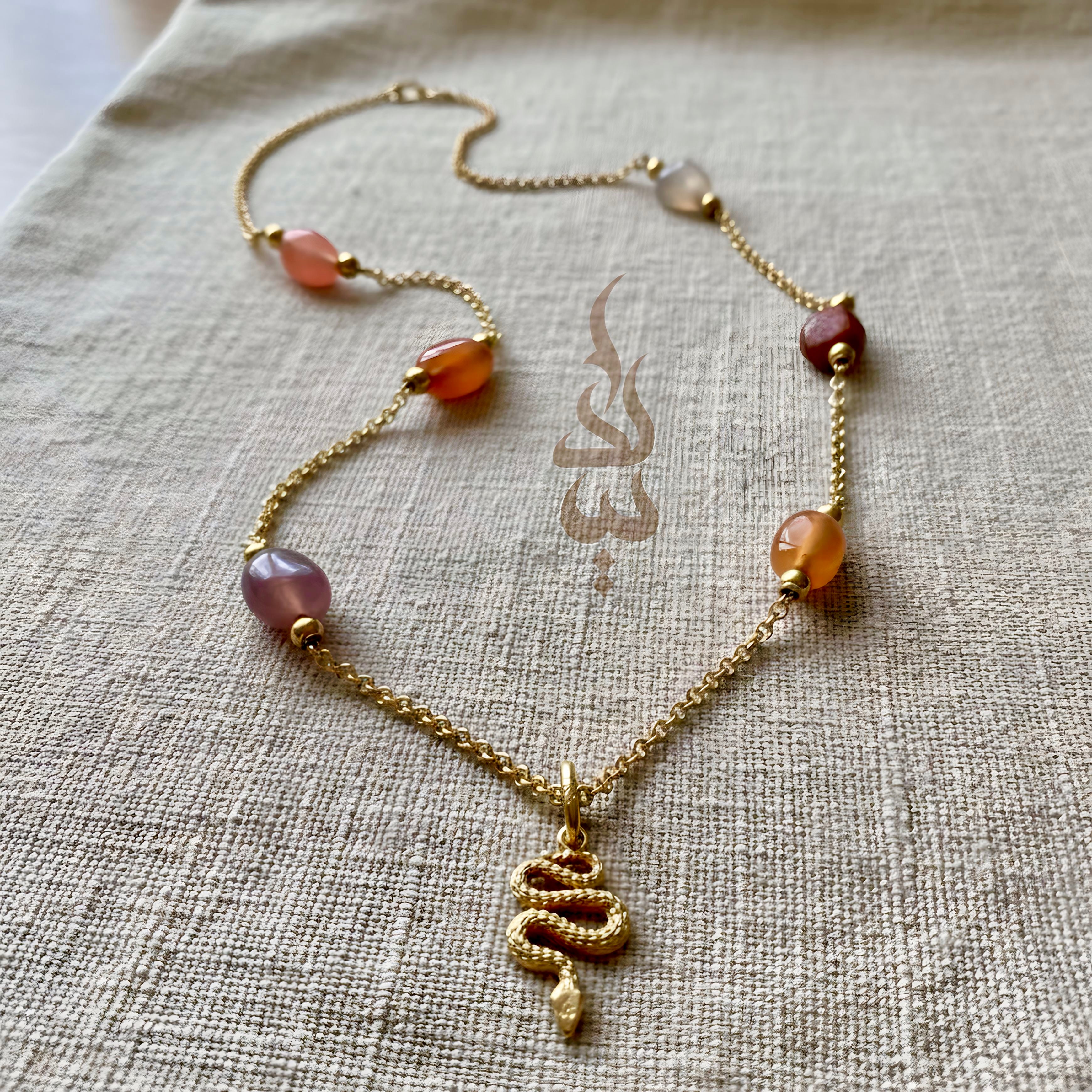 18K gold crafted with quartz stone snake pendant