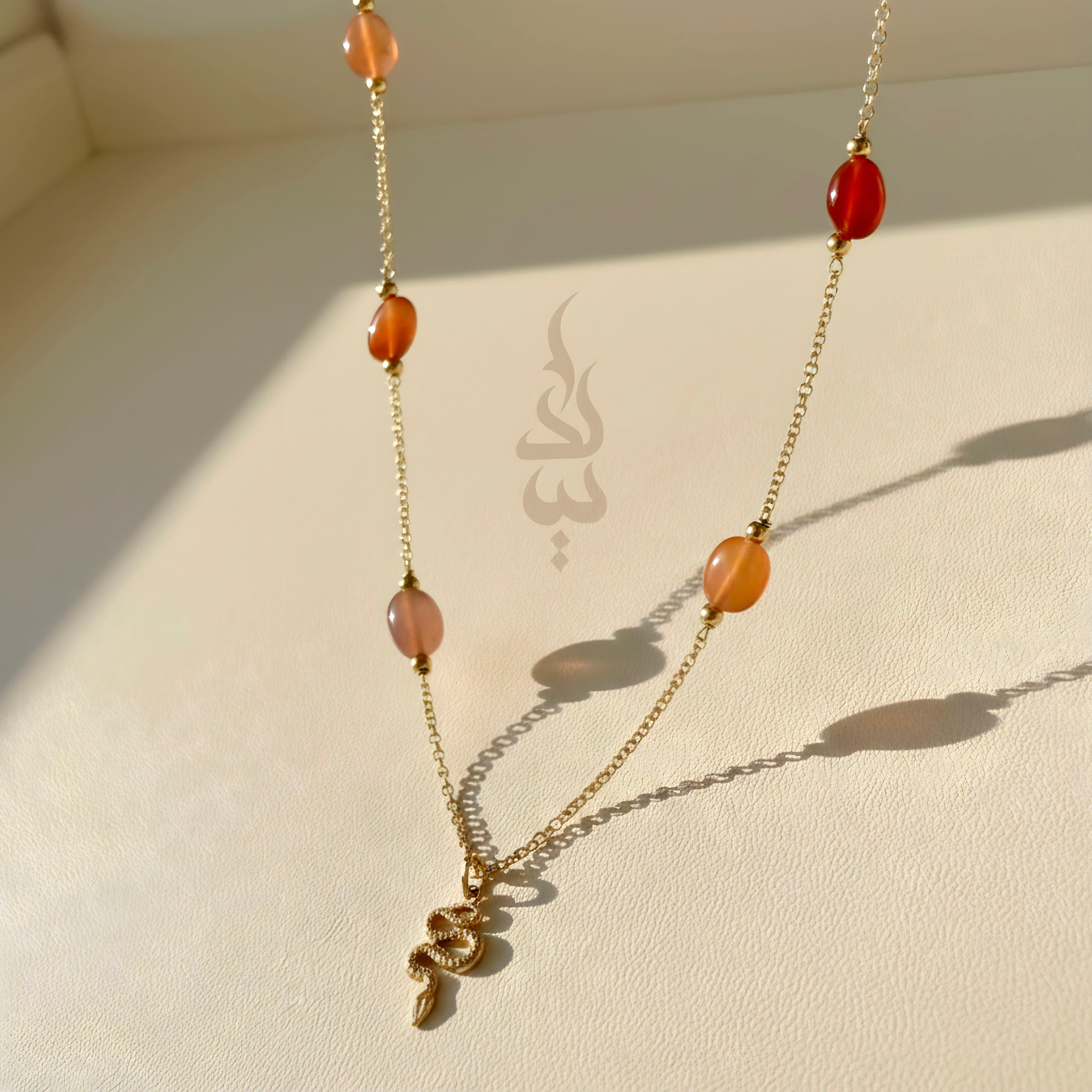 18K gold crafted with quartz stone snake pendant