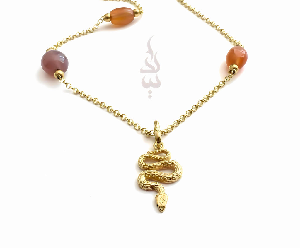 18K gold crafted with quartz stone snake pendant