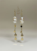 18K gold earrings crafted with a natural baroque pearl