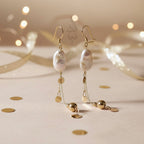 18K gold earrings crafted with a natural baroque pearl