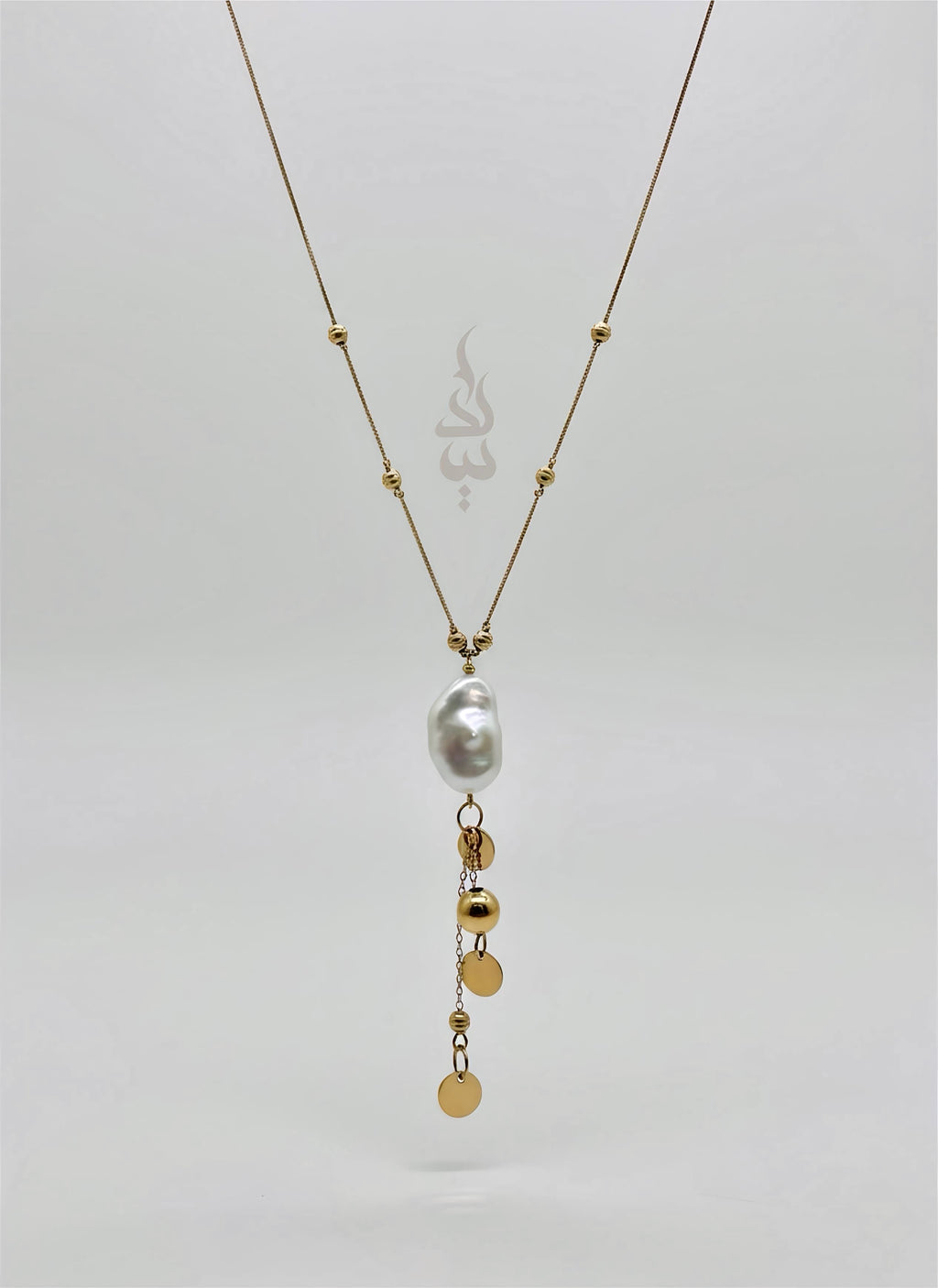18K gold necklace with natural baroque pearl