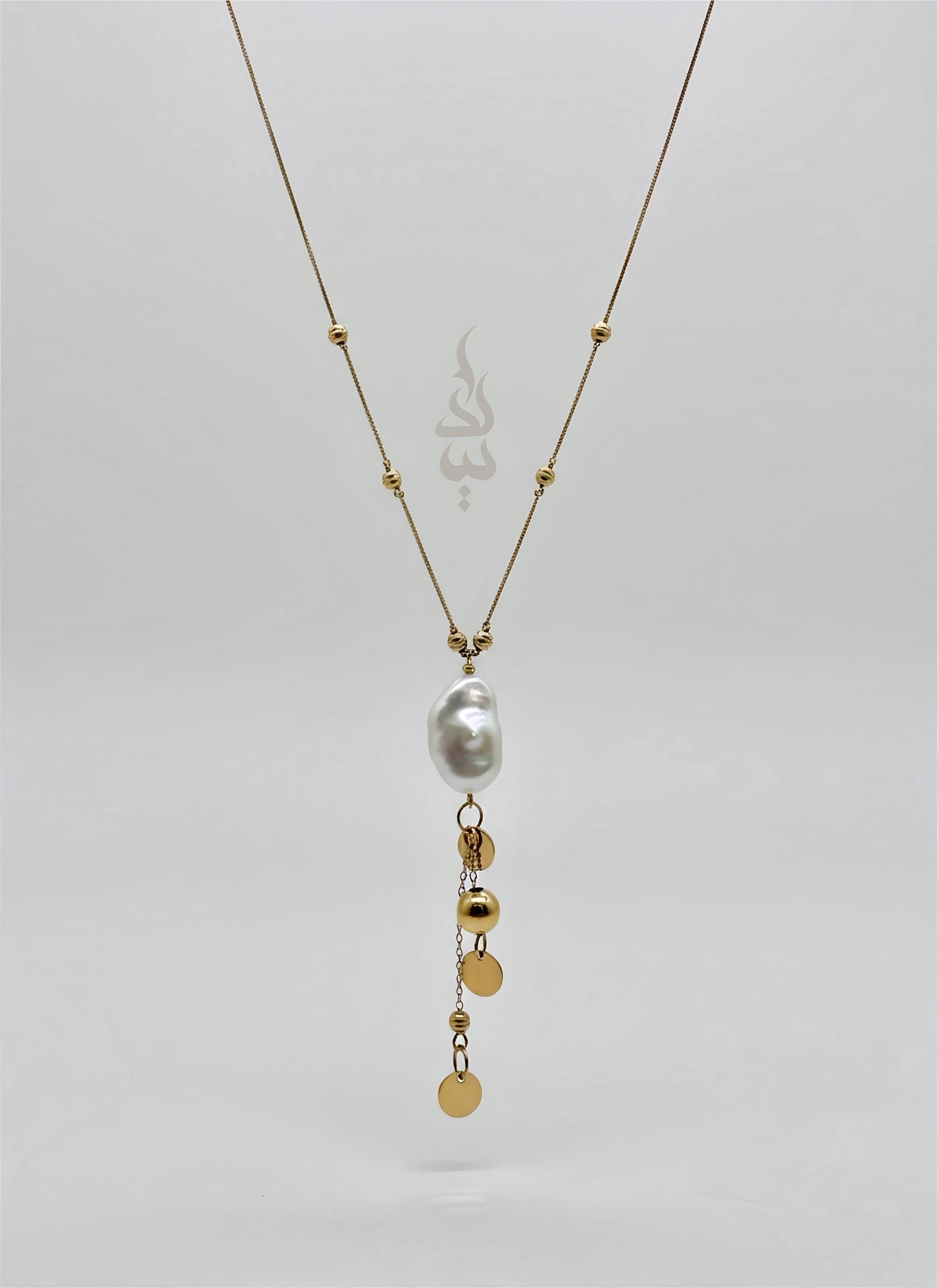 18K gold necklace with natural baroque pearl