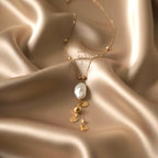 18K gold necklace with natural baroque pearl