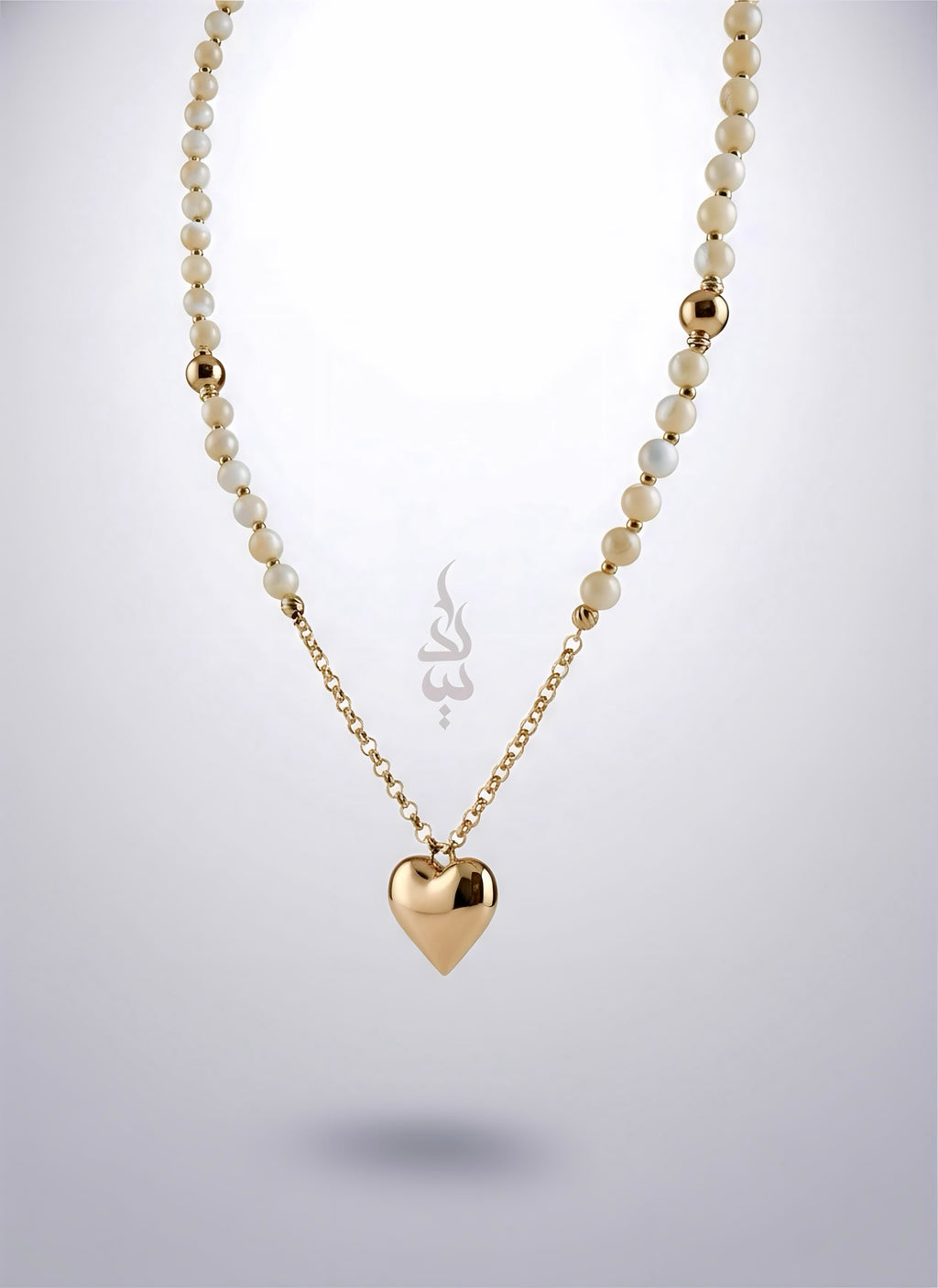18K gold necklace with a heart pendant crafted with shell