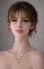 18K gold necklace with a heart pendant crafted with shell