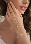 18K Gold hand chain with delicate heart charms and tiny beads