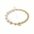 18K gold bracelet with a heart charm crafted with natural pearls