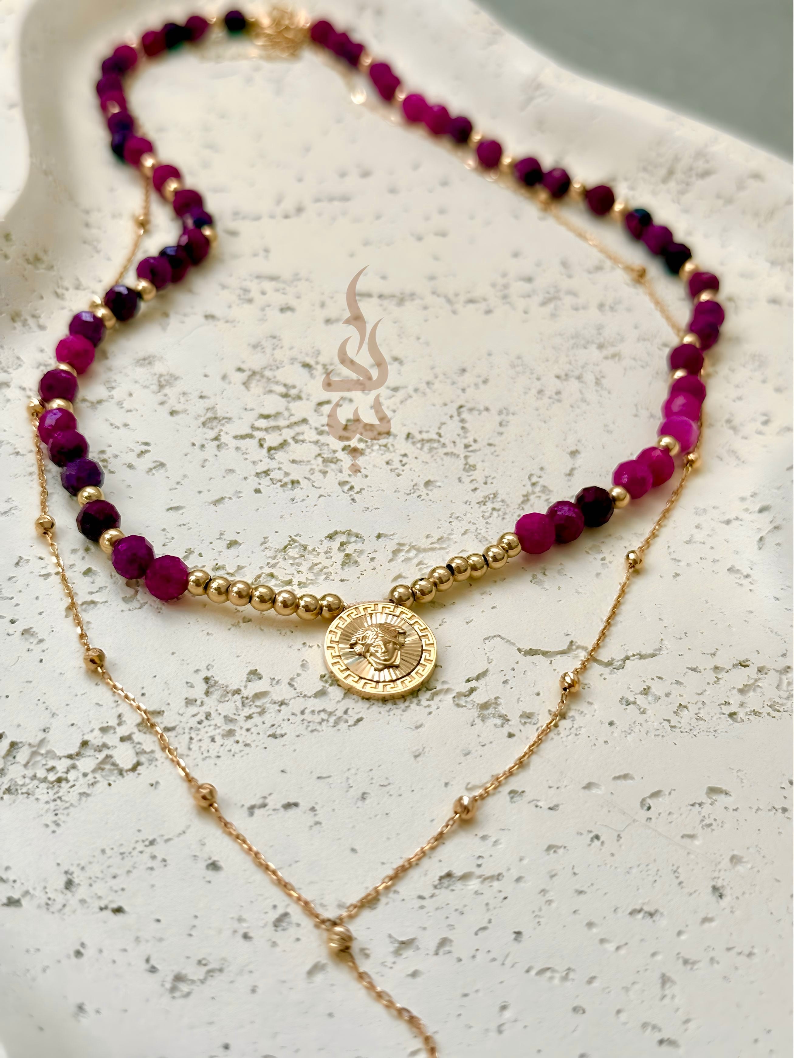 18K gold necklace crafted with ruby stones and Versace pendant - 18K gold chain with Dimond cut beads