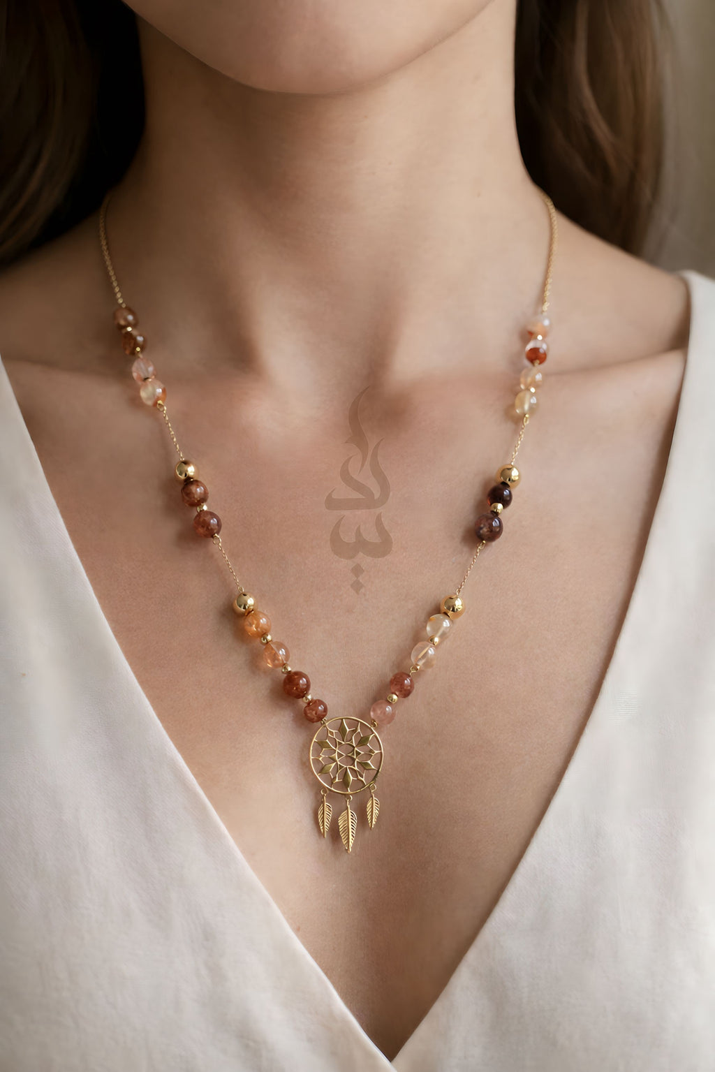 18K gold necklace with dreamcatcher pendant and carnelian stone