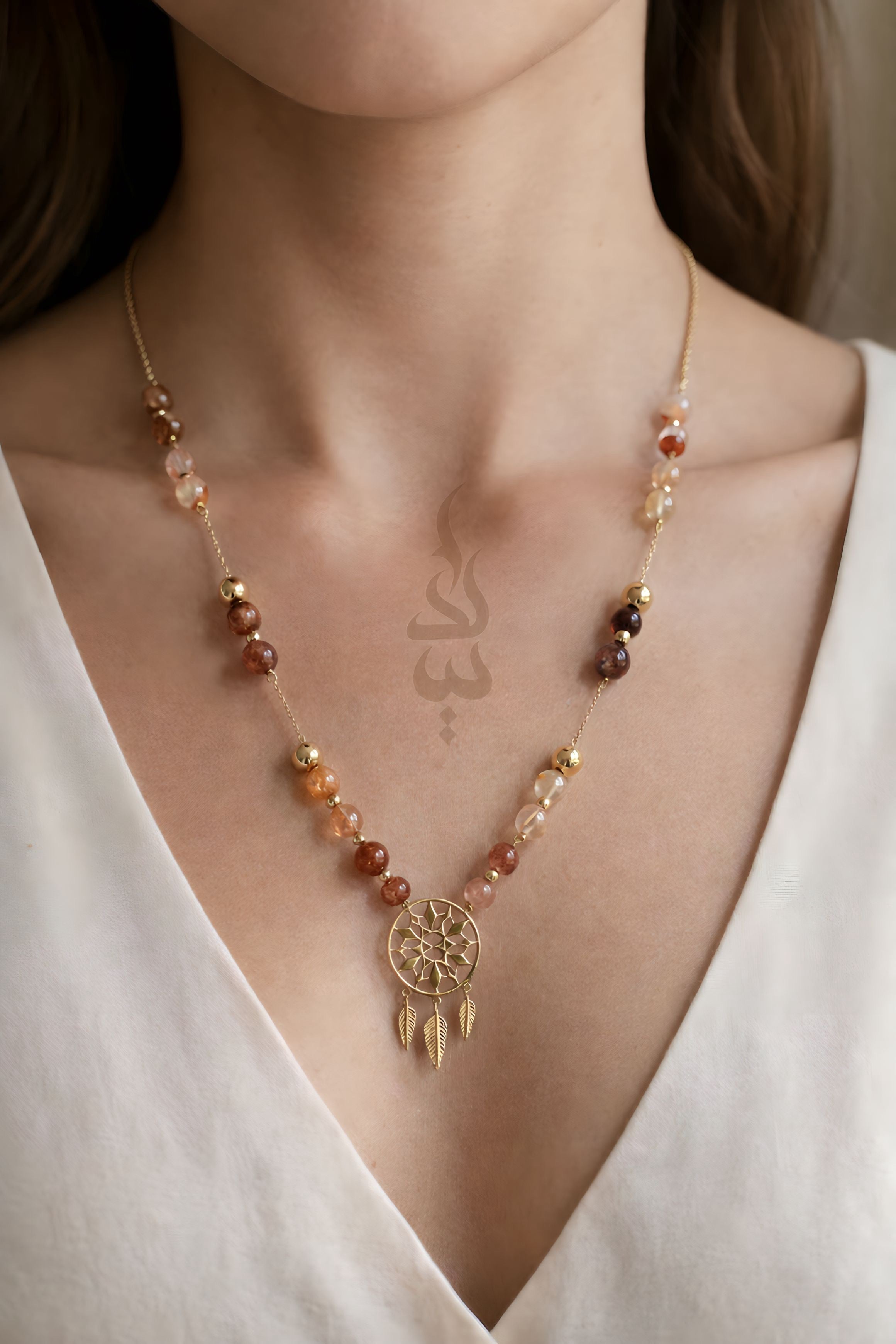 18K gold necklace with dreamcatcher pendant and carnelian stone