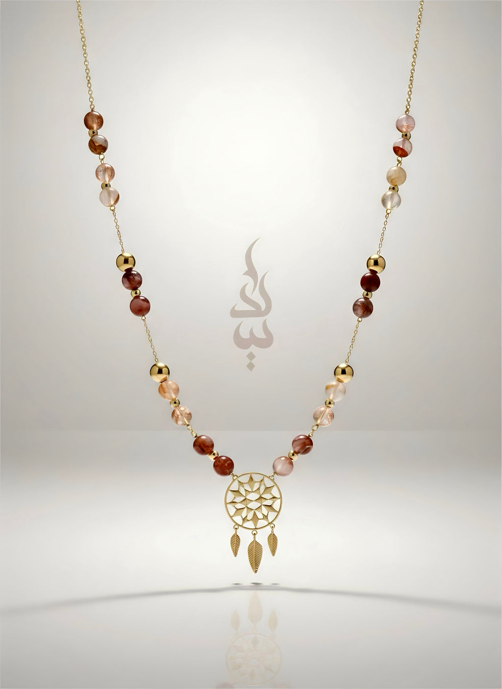 18K gold necklace with dreamcatcher pendant and carnelian stone