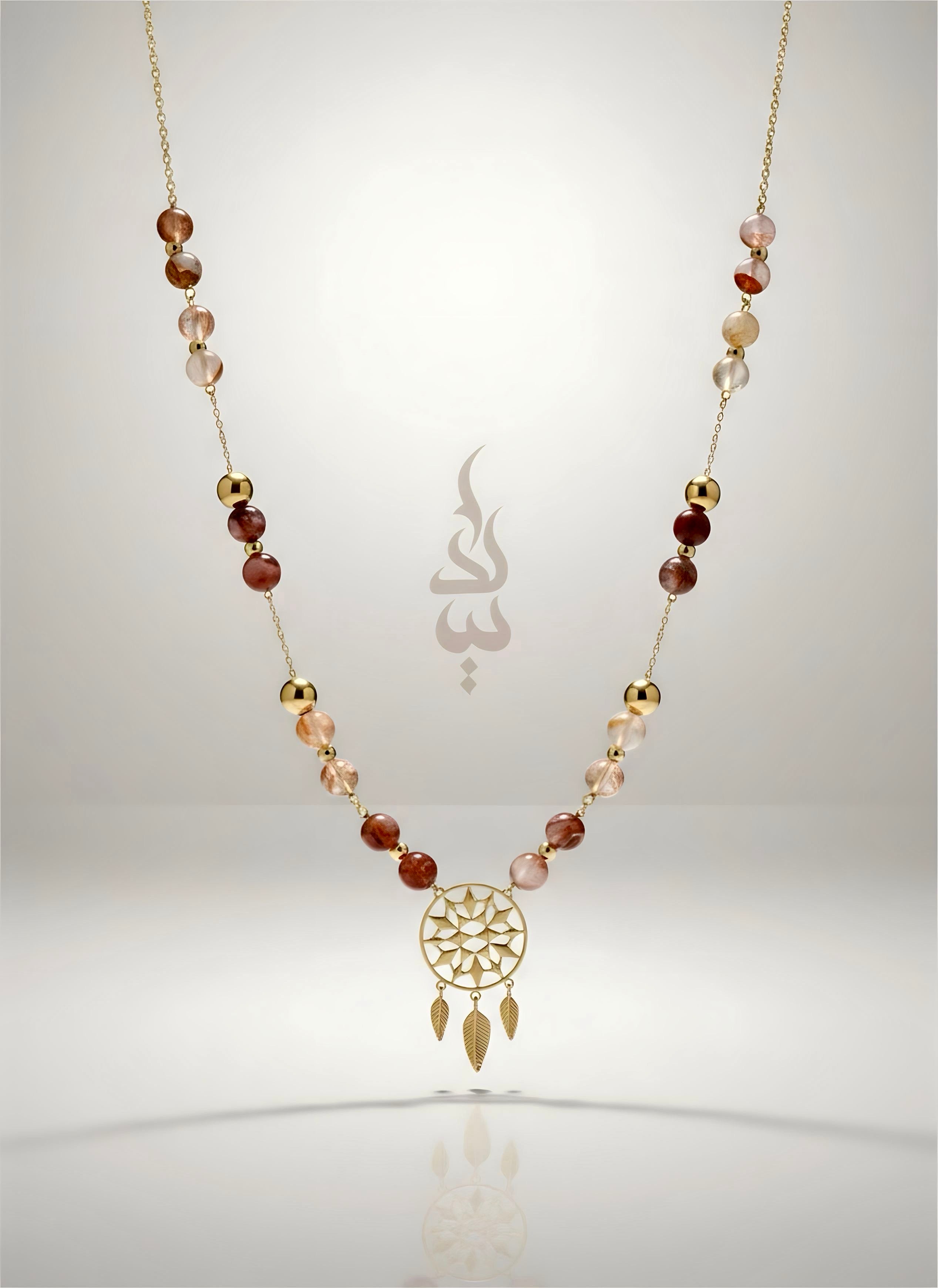 18K gold necklace with dreamcatcher pendant and carnelian stone