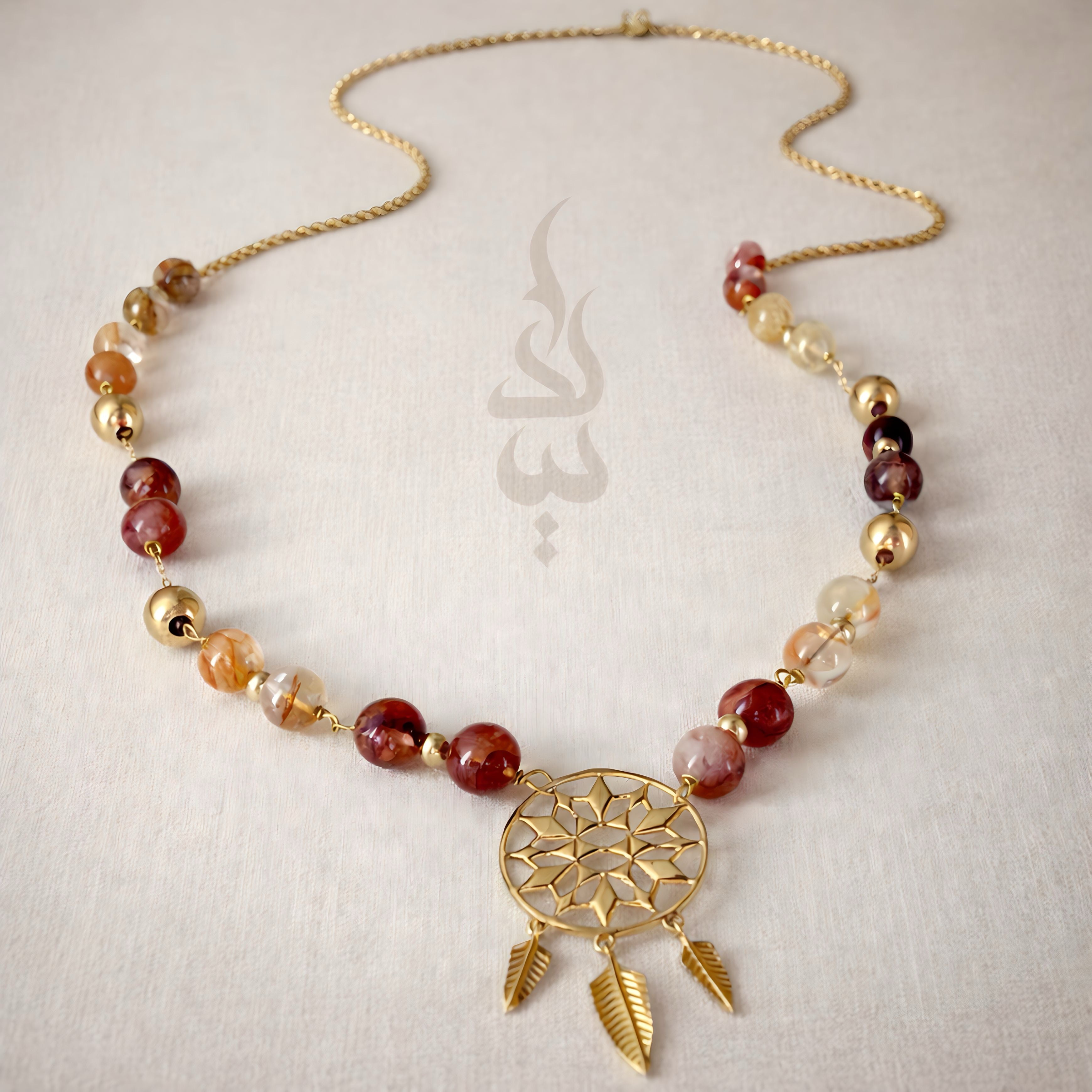 18K gold necklace with dreamcatcher pendant and carnelian stone
