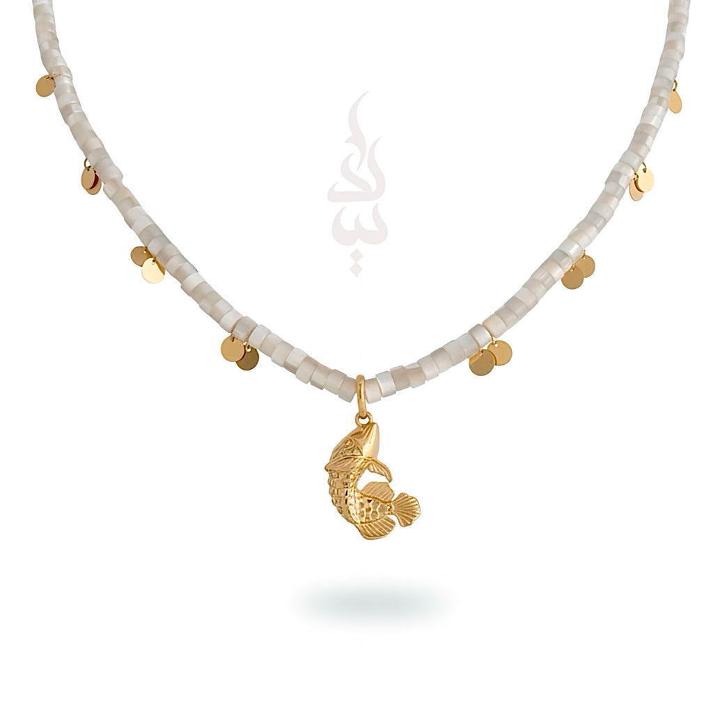 18K gold necklace with a fish pendant and shiny gold scales