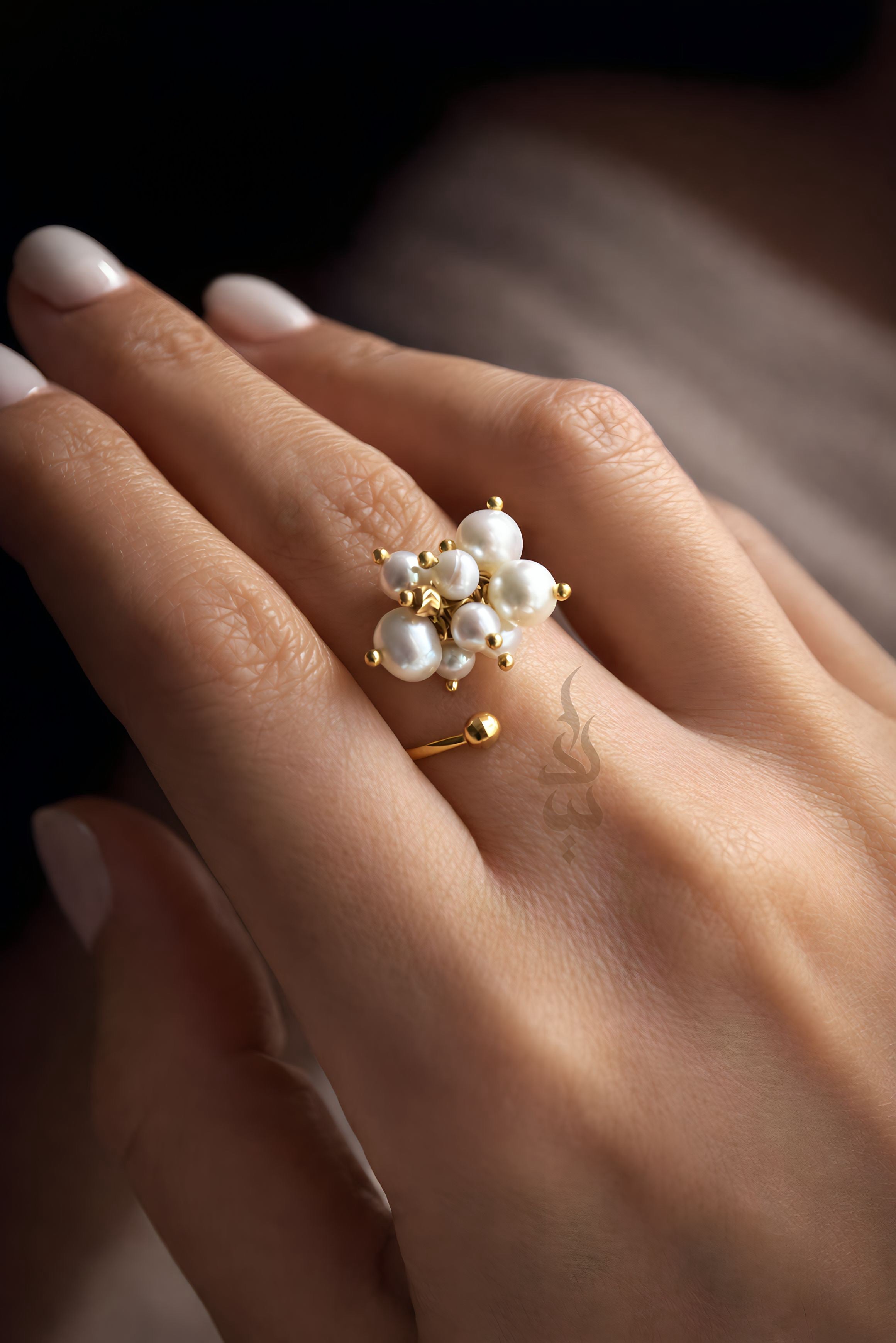 18K gold ring crafted with natural pearls