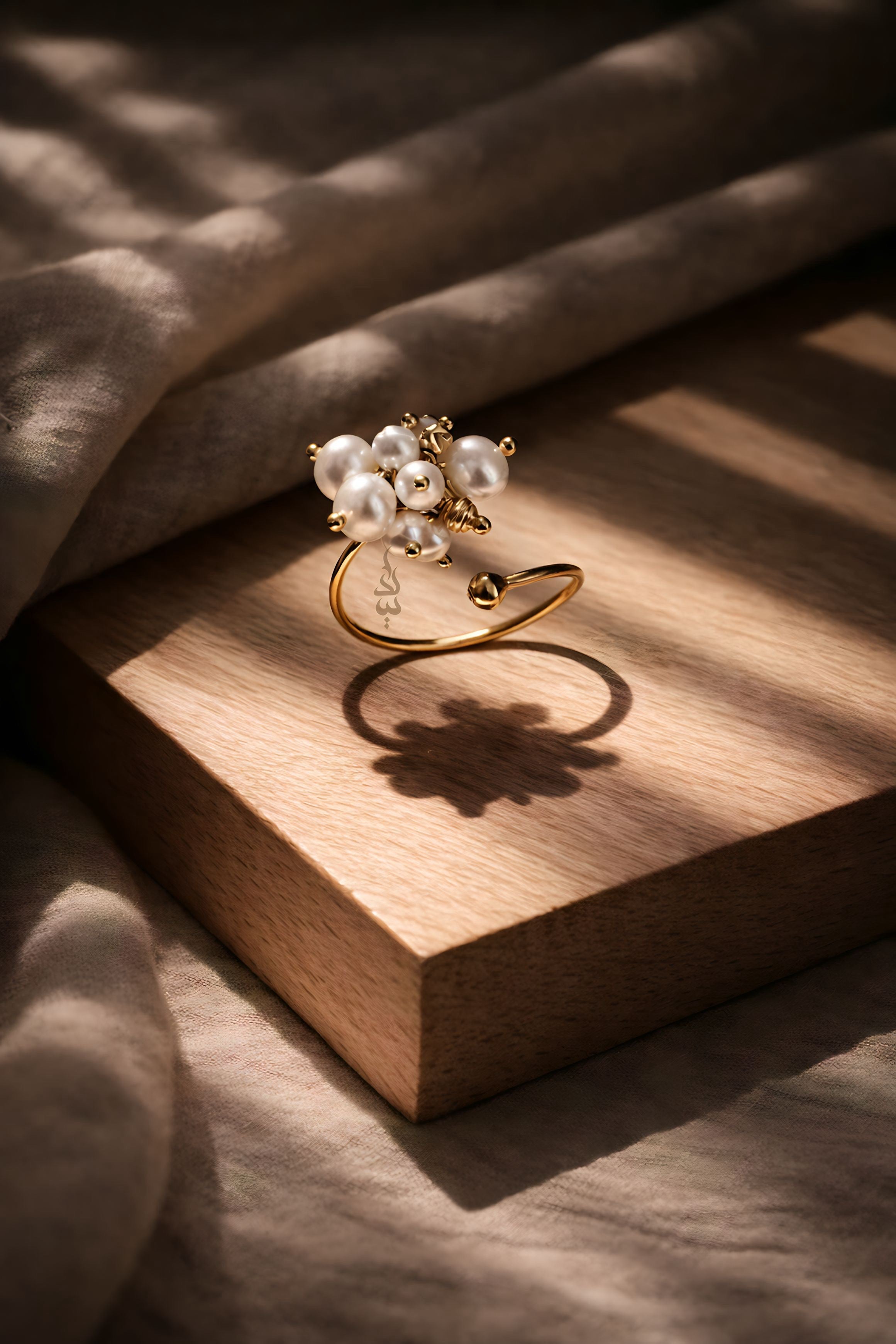 18K gold ring crafted with natural pearls