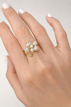18K gold ring crafted with natural pearls