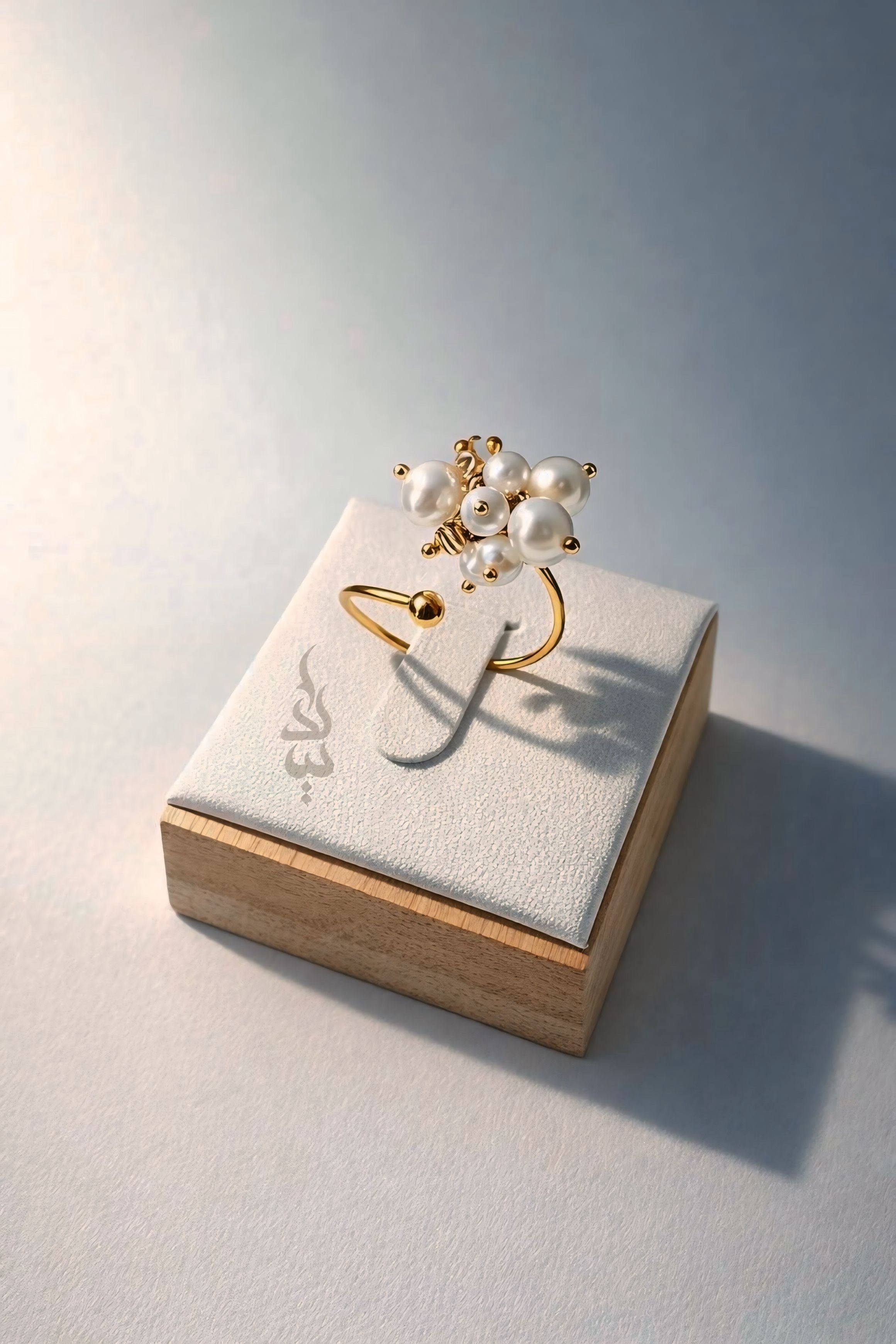 18K gold ring crafted with natural pearls