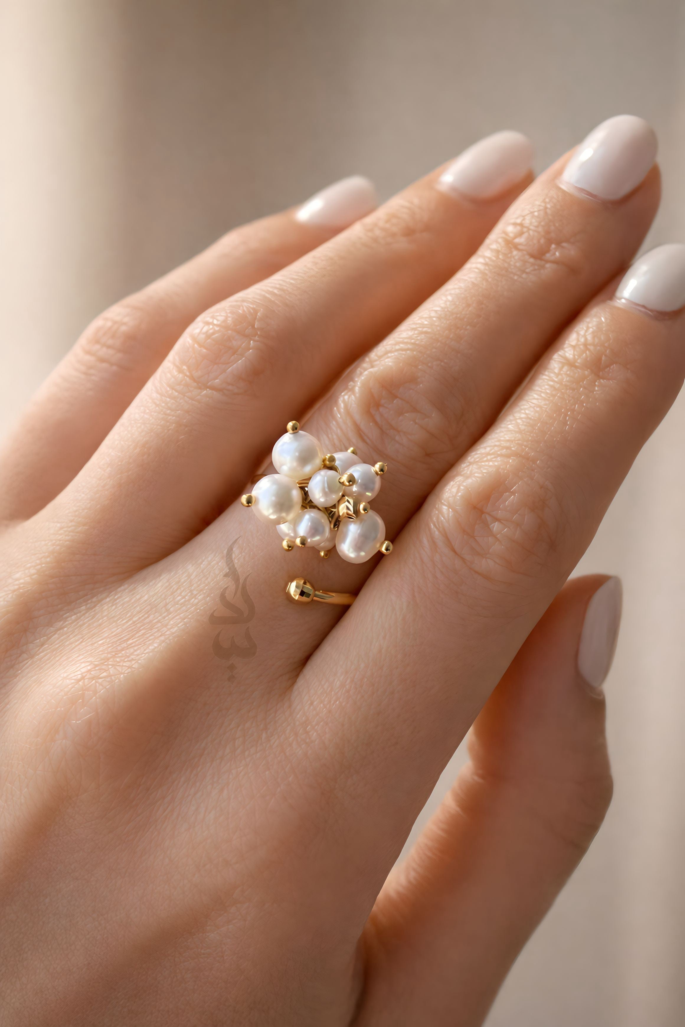 18K gold ring crafted with natural pearls