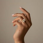 18K gold ring crafted with natural pearls