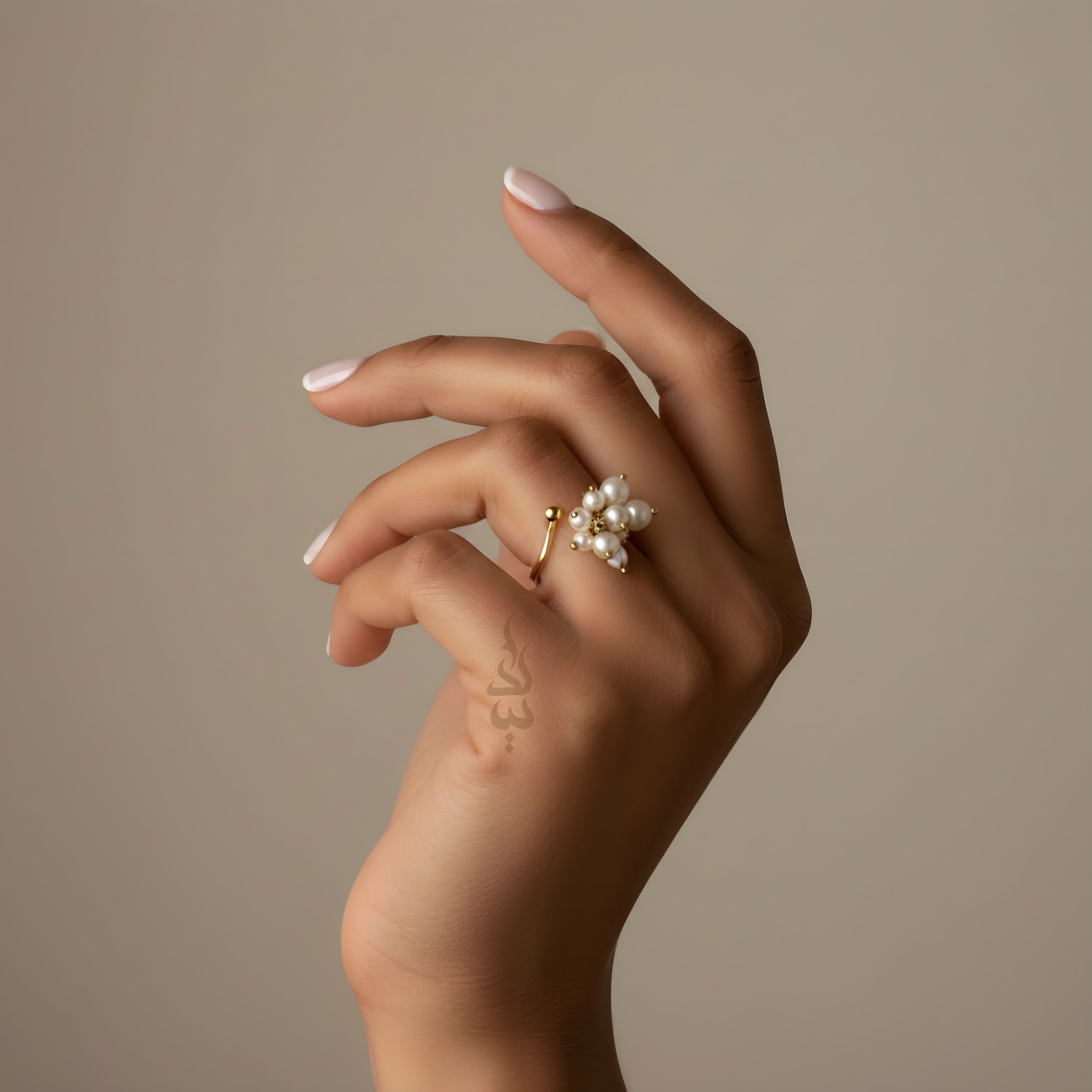 18K gold ring crafted with natural pearls