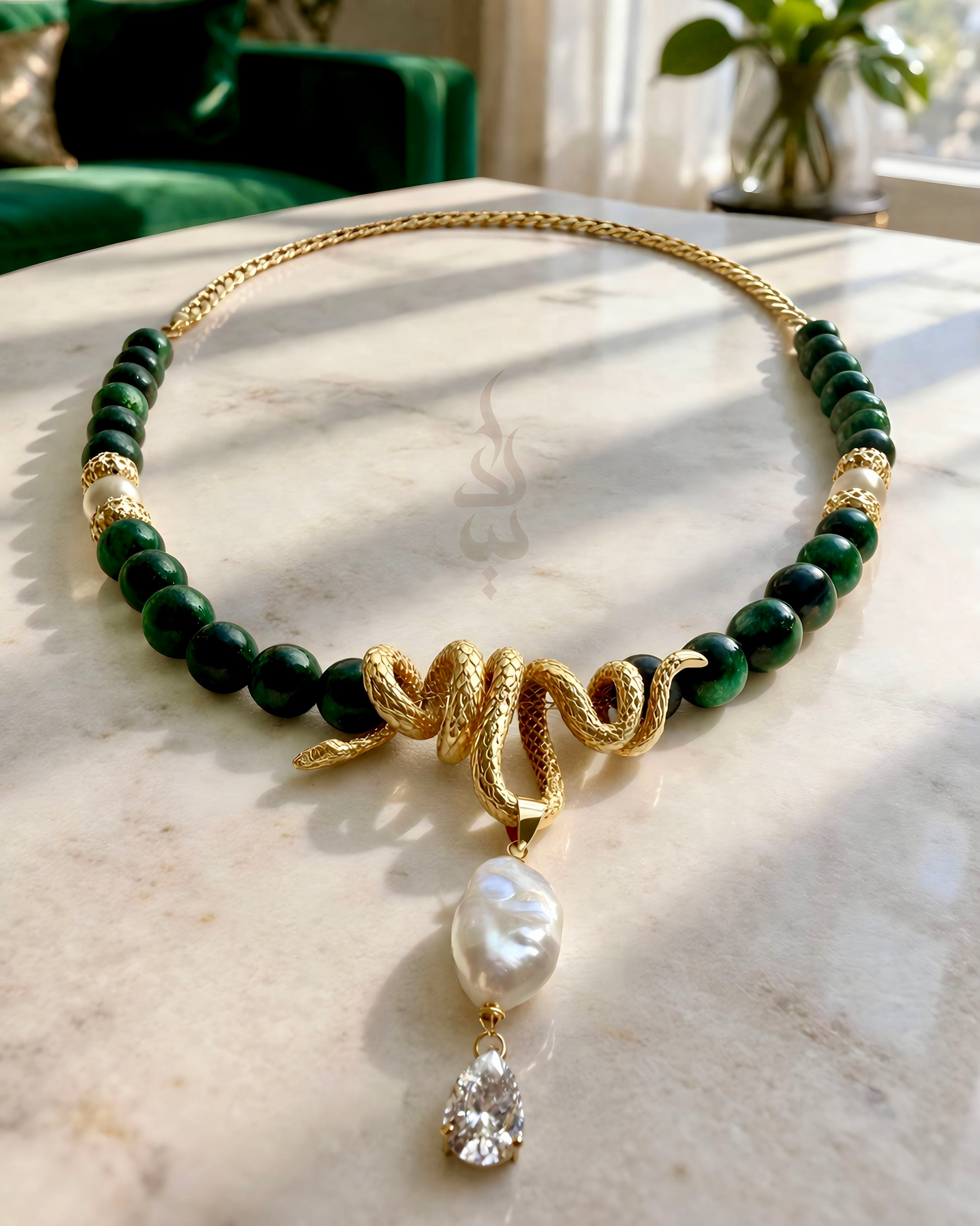 18K gold crafted with natural emerald and pearl with serpent pendant