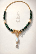 18K gold crafted with natural emerald and pearl with serpent pendant