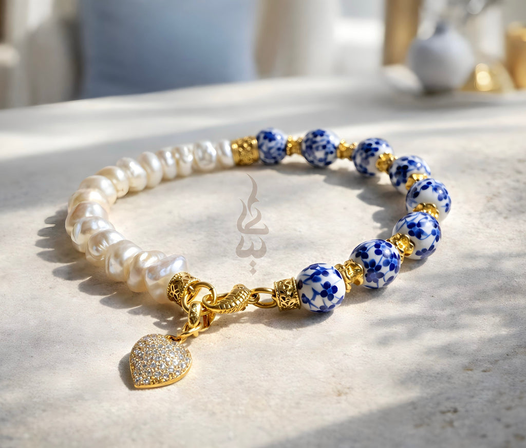 925 silver (18K gold plated) bracelet crafted with natural pearls and ceramicbeads