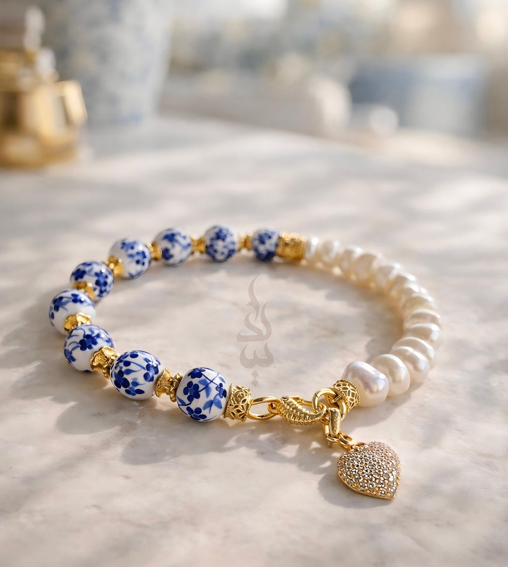925 silver (18K gold plated) bracelet crafted with natural pearls and ceramicbeads