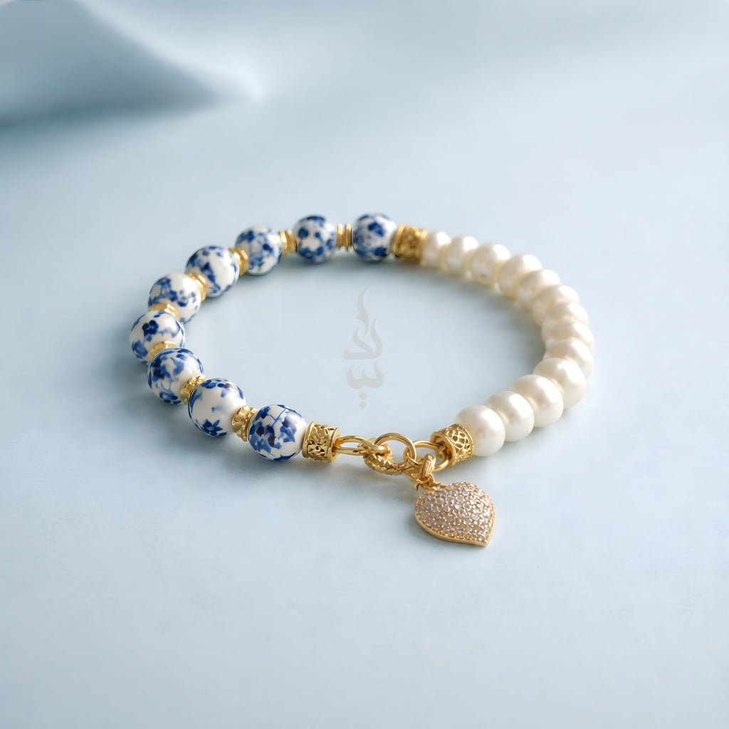 925 silver (18K gold plated) bracelet crafted with natural pearls and ceramicbeads