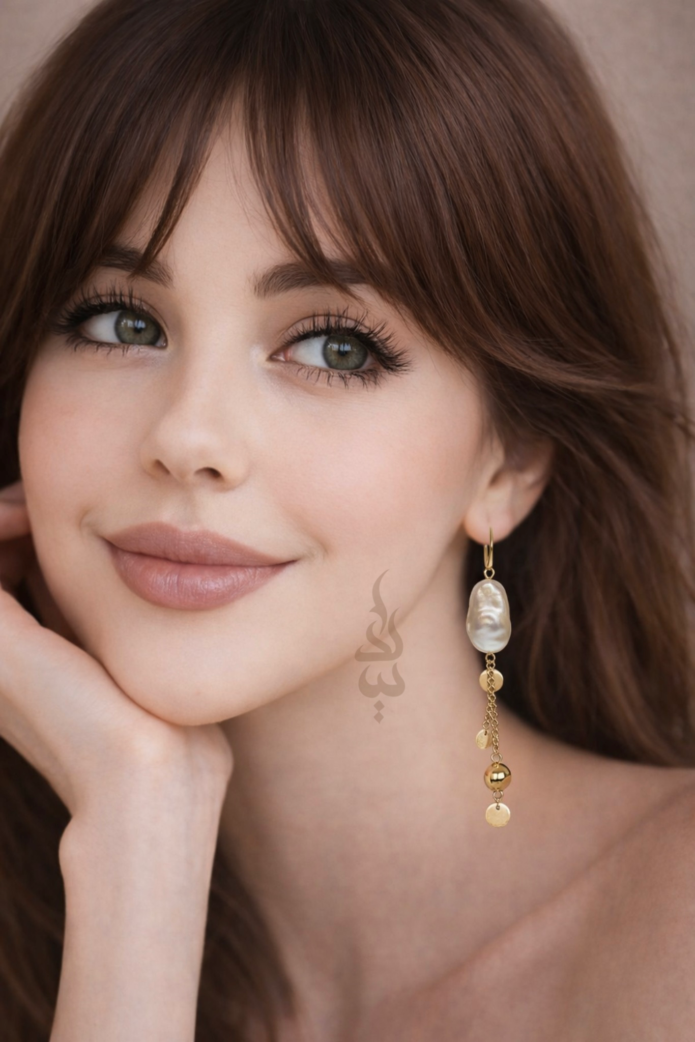 18K gold earrings crafted with a natural baroque pearl
