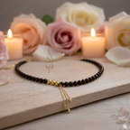 Handcrafted necklace with 18K gold beads and chain paired with natural garnet stone